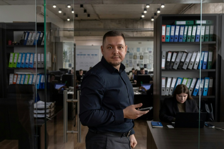 Head of the Inter Trans logistics company Viktor Berestenko poses for a photograph at his office in Odesa on February 18, 2026. The main gateway to the Black Sea and beyond, Odesa is a key logistics hub for Ukraine, one of the world's top agricultural exporters. Russia has intensified its attacks on the region - tripling the number of missile and drone strikes over the last year in what officials call an attempt to cut Ukraine off from the sea. ( AFP / Oleksandr GIMANOV )