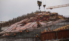 Des ouvriers travaillent sur un chantier de construction à Shanghai