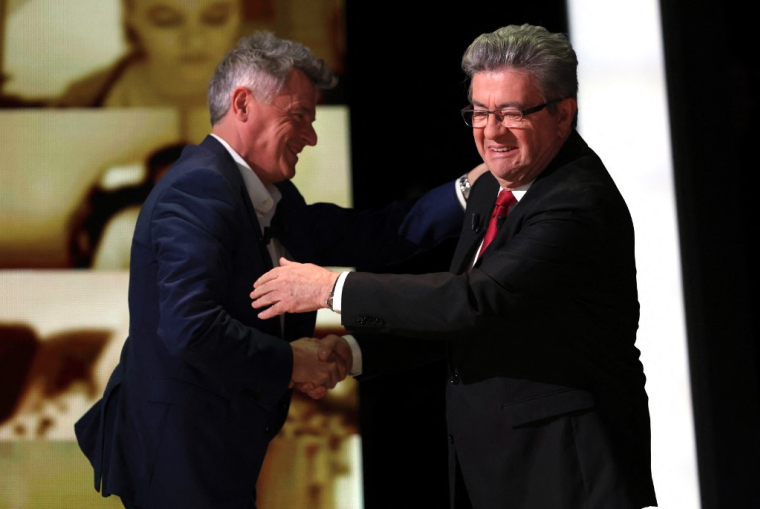 Fabien Roussel et Jean-Luc Mélenchon à Saint-Denis, le 31 mars 2022. ( AFP / THOMAS COEX )
