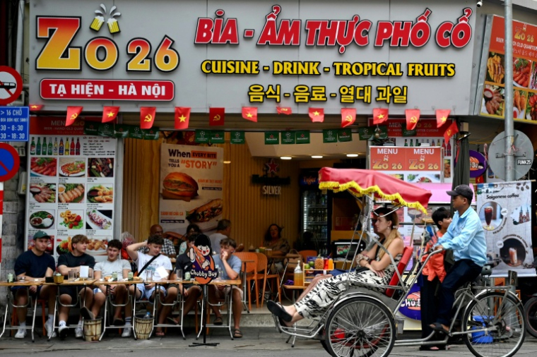 Une rue de Hanoï le 16 juin 20225, au Vietnam ( AFP / Nhac NGUYEN )