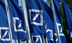 POURQUOI L'ALLEMAGNE VEUT UNE FUSION POUR RENFORCER DEUTSCHE BANK