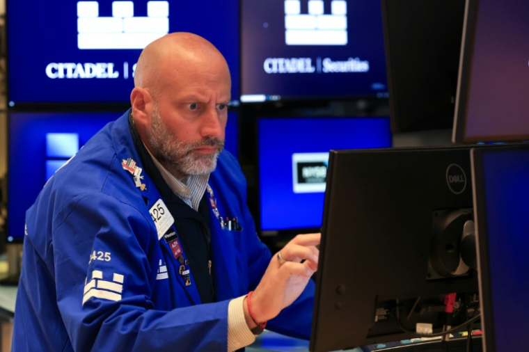 Un opérateur à la Bourse de New York, le 17 août 2026 ( AFP / TIMOTHY A. CLARY )