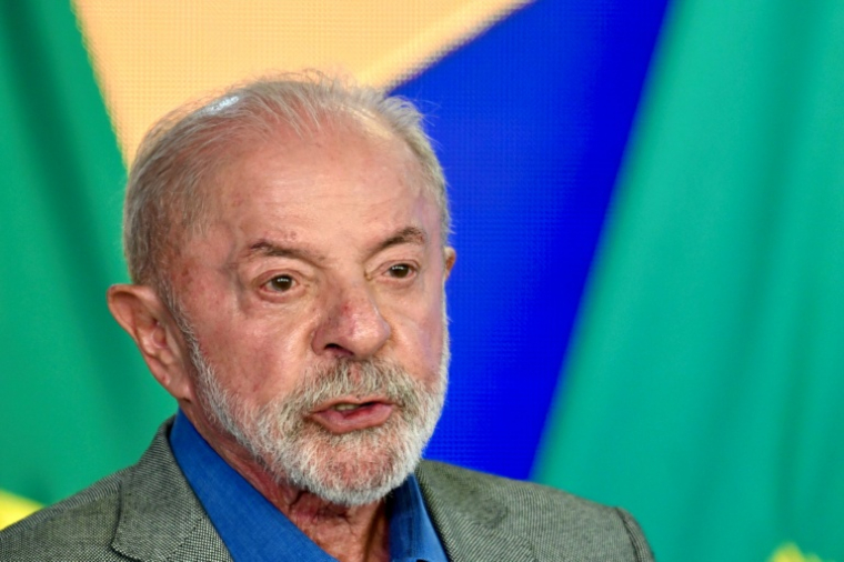 Le président du Brésil et candidat à l'élection présidentielle, Luiz Inácio Lula da Silva, prend la parole au palais du Planalto, à Brasilia, le 14 octobre 2026 ( AFP / Evaristo Sa )