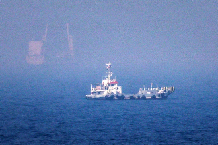 Des navires dans le détroit d'Ormuz, au large de Khor Fakkan, aux Emirats arabes unis, le 13 juillet 2026 ( AFP / - )