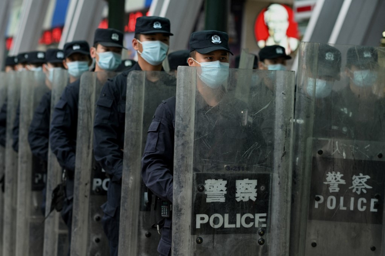 Des policiers chinois à Shenzhen, en septembre 2021 (illustration) ( AFP / NOEL CELIS )