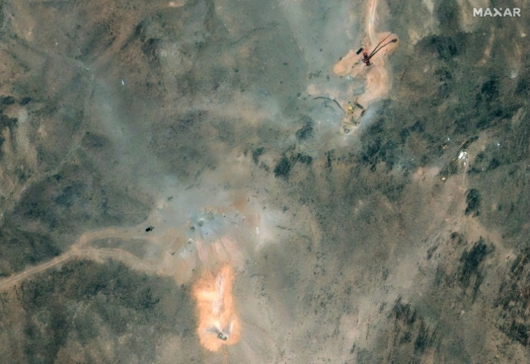 Image satellite fournie par Maxar Technologies le 1er juillet 2025 montrant le site nucléaire iranien de  Fordo, au sud de Téhéran, visé par des frappes américaines le 22 juin ( Satellite image ©2025 Maxar Technologies / - )