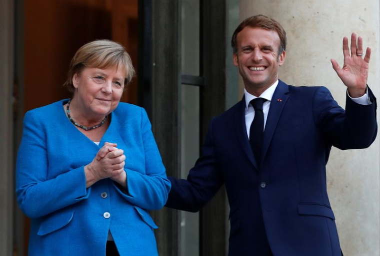 MACRON ET MERKEL PROMETTENT DE COOPÉRER JUSQU'À LA FORMATION DU PROCHAIN GOUVERNEMENT ALLEMAND