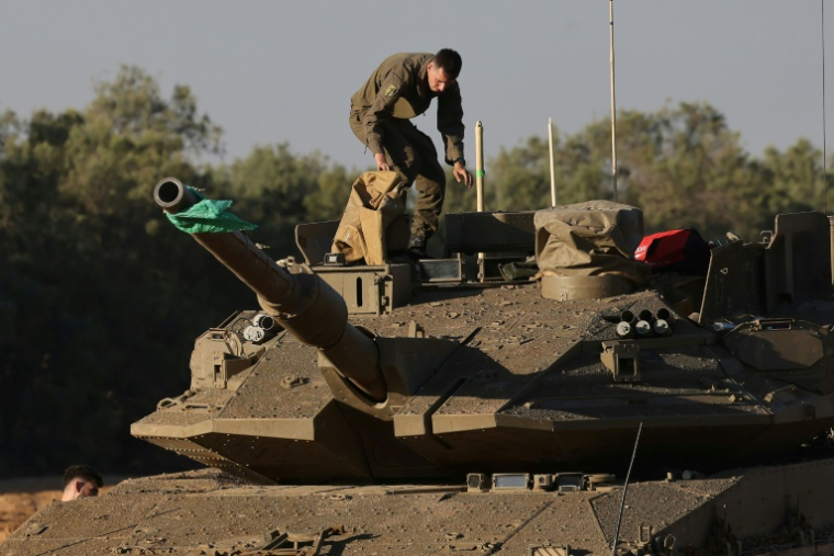 Déploiement de troupes israéliennes près de la frontière avec la bande de Gaza, le 5 mai 2025 ( AFP / Menahem KAHANA )