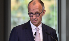 La chancelier allemand Friedrich Merz devant la Chambre allemande de commerce et d'industrie, Berlin, le 7 mai 2026 ( AFP / John MACDOUGALL )