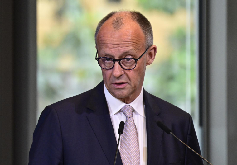 La chancelier allemand Friedrich Merz devant la Chambre allemande de commerce et d'industrie, Berlin, le 7 mai 2026 ( AFP / John MACDOUGALL )