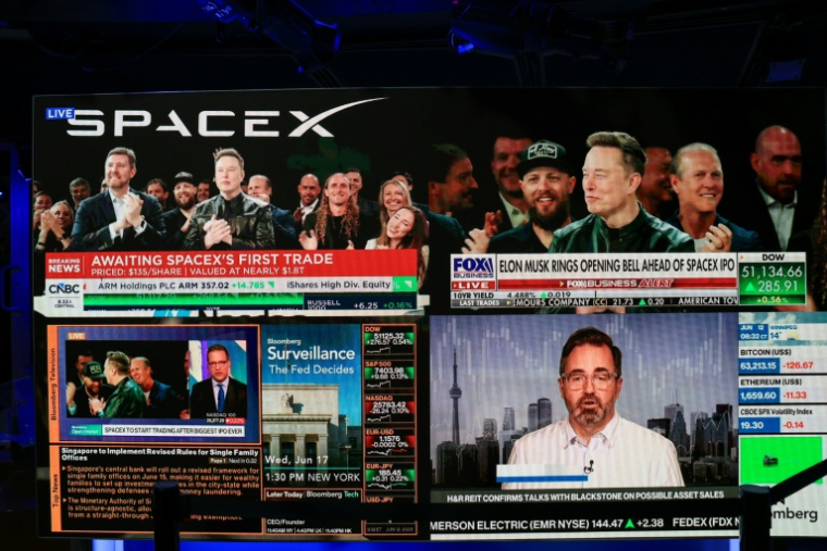 Premier jour de cotation de SpaceX à la Bourse de New York, le 12 juin 2026 ( AFP / TIMOTHY A. CLARY )