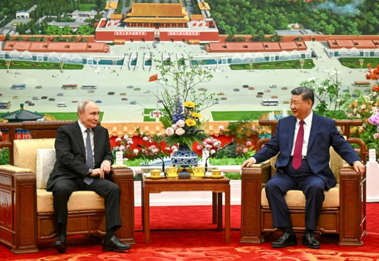 Vladimir Poutine et Xi Jinping à Pékin le 20 mai 2026 ( POOL / Kristina Solovyova )