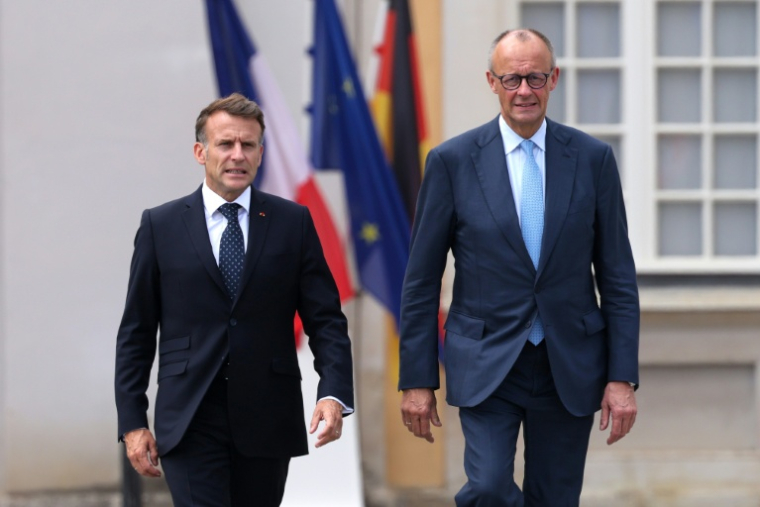 Le président français Emmanuel Macron (à gauche) et le chancelier allemand Friedrich Merz le 17 juillet à Brühl en Allemagne ( AFP / Ludovic MARIN )