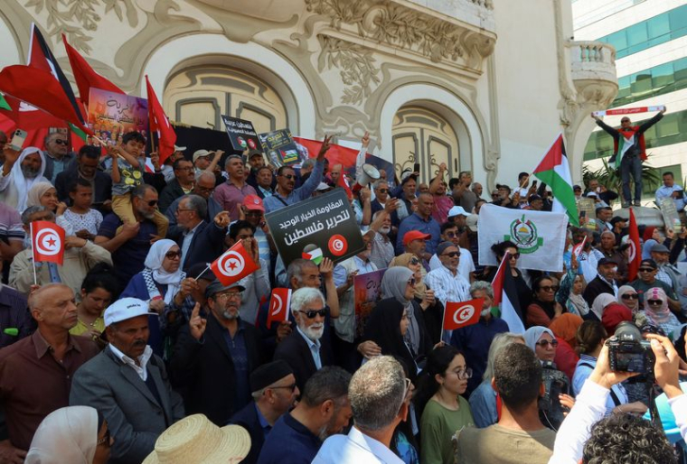 Protest demanding the release of imprisoned journalists, activists, opposition figures and setting a date for fair presidential elections in Tunis