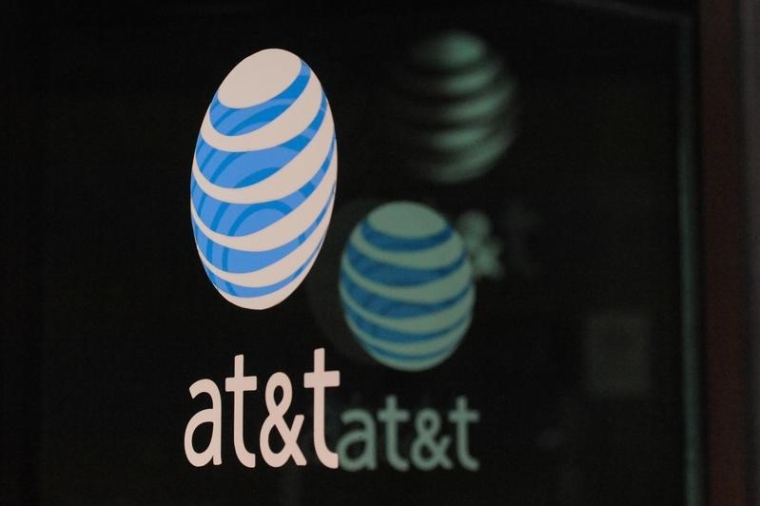 AT&T CONFIANT DANS SON PROJET DE FUSION
