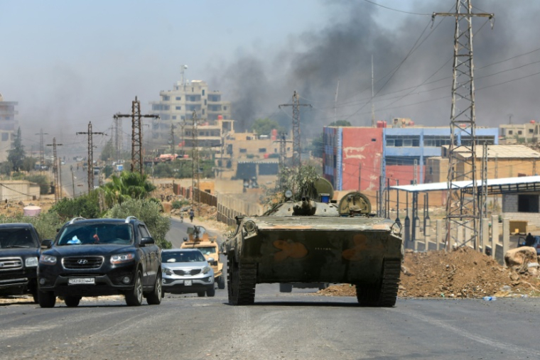 Arrivée des forces syriennes dans la ville à majorité druze de Soueida, le 15 juillet 2025 ( AFP / Bakr ALKASEM )