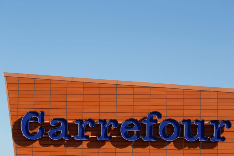 CARREFOUR: LES INVESTISSEURS SALUENT LA FIN DE L'AVENTURE CHINOISE