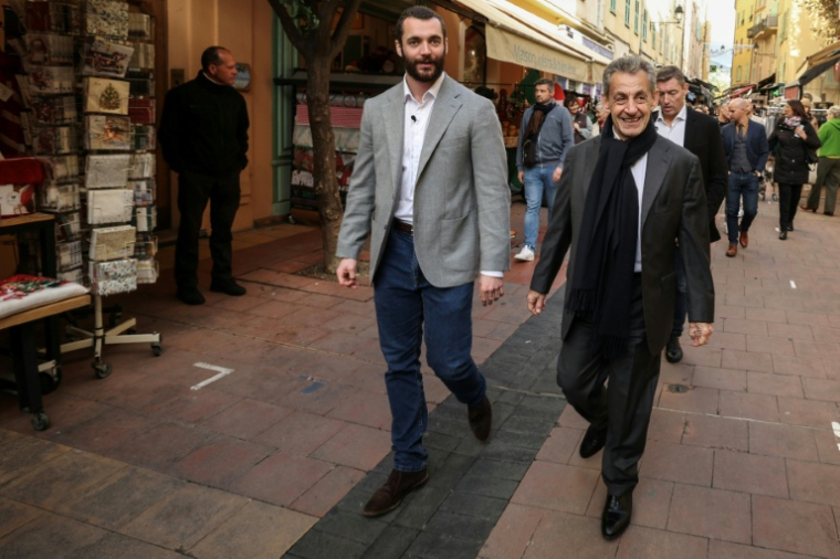 Louis et Nicolas Sarkozy à Menton, le 12 décembre 2025 ( AFP / Valery HACHE )