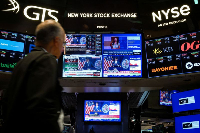 PHOTO D'ARCHIVES : Réaction des traders à l'annonce des taux directeurs de la Fed à la Bourse de New York (NYSE).