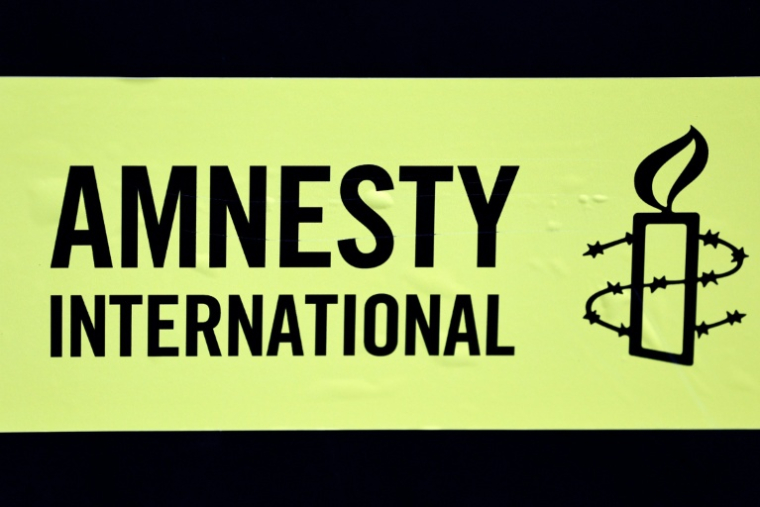 Amnesty exhorte les pays à résister aux dirigeants "prédateurs" comme Trump, Poutine ou Netanyahu ( AFP / STEPHANE DE SAKUTIN )