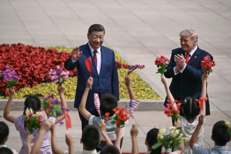 Les présidents chinois Xi Jinping et américain Donald Trump, le 14 mai 2026 à Pékin ( AFP / Brendan SMIALOWSKI )