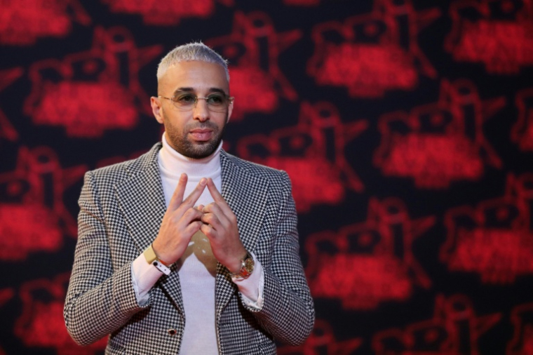 Le rappeur Naps à Cannes, le 20 novembre 2021 ( AFP / Valery HACHE )