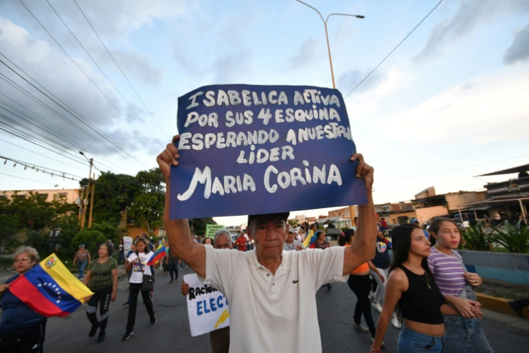Manifestation réclamant le retour de l'opposante María Corina Machado à Valencia le 25 septembre 2026  ( AFP / Jacinto OLIVEROS )