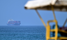 Un porte-conteneurs au large de l'émirat de Sharjahn dans le golfe d'Oman, le 28 juin 2026 ( AFP / - )