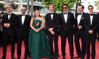 L'équipe du film "The Phoenician Scheme" au 78e Festival de Cannes dimanche 18 mai ( AFP / Valery HACHE )