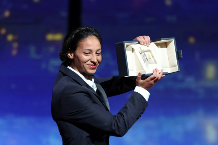Nadia Melliti, Prix d'interprétation féminine au Festival de Cannes, le 24 mai 2025 pour son rôle dans le film "La Petite derniere" ( AFP / Sameer AL-DOUMY )