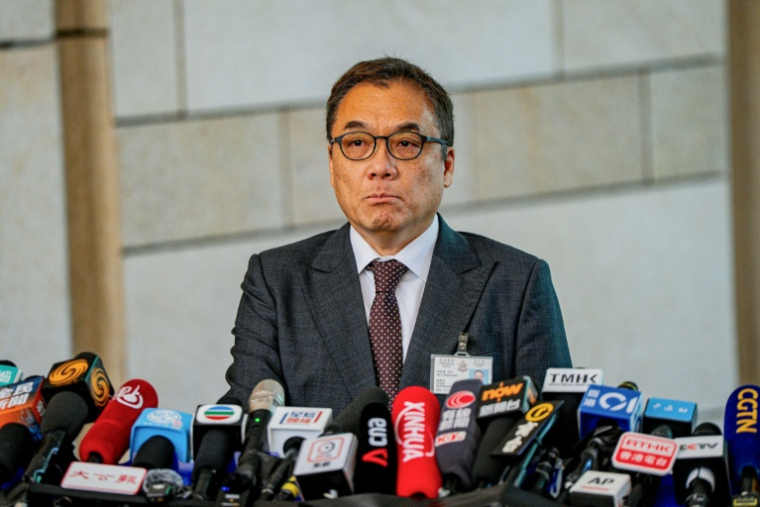 Le commissaire Steve Li, chef de la police nationale de sécurité, lors d'une conférence de presse après le verdict dans le procès de Jimmy Lai, le 15 décembre 2025 à Hong Kong ( AFP / Leung Man Hei )