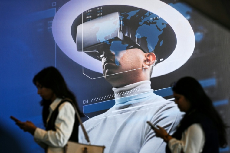 Des visiteuses au Sommet sur l'impact de l'IA, le 17 février 2026 à New Delhi, en Inde ( AFP / Arun SANKAR )