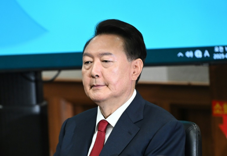 L'ancien président sud-coréen Yoon Suk Yeol assiste à son procès pour insurrection au tribunal central de Séoul, le 21 avril 2025 ( POOL / JUNG YEON-JE )