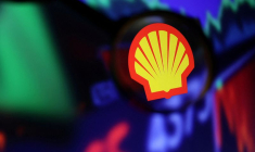 PHOTO DE FICHIER : Illustration du logo Shell et d'un graphique boursier