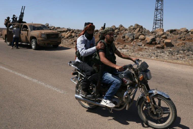 Des forces de sécurité syriennes près du village druze d'Al-Mazraah, dans le sud de la Syrie, le 14 juillet 2025 ( AFP / Bakr ALkasem )
