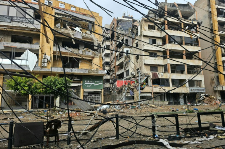 Des immeubles détruits dans le sud de Beyrouth après une frappe israélienne, le 21 mars 2026 ( AFP / STR )