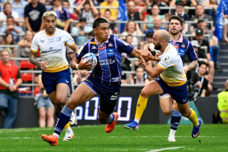 L'arrière néo-zélandais de l'Union Bordeaux-Bègles  back #15 Salesi Rayasi (C) lors de la victoire contre le Leinster en finale de la Champions Cup de rugby, le 23 mai 2026 à Bilbao ( AFP / Ander Gillenea )