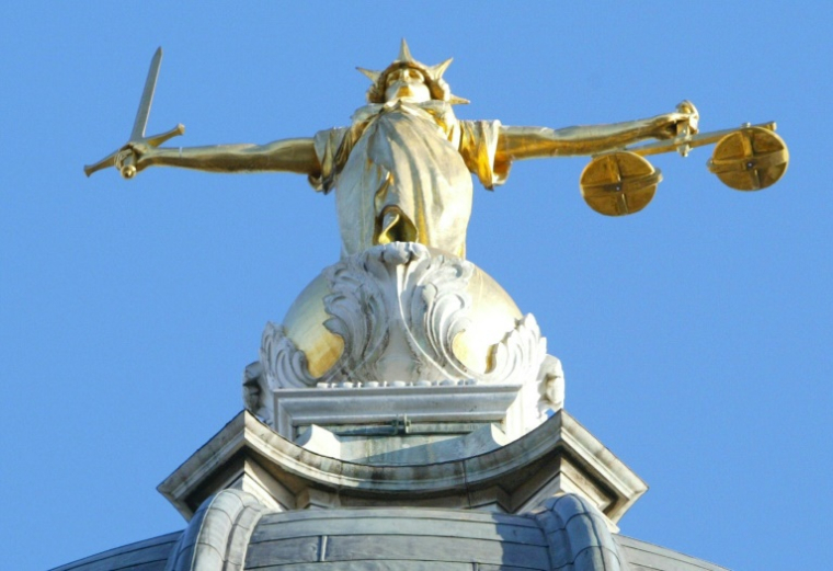 Trois ressortissants iraniens inculpés pour espionnage et préparation d'actes violents au Royaume-Uni au profit de l'Iran ont été présentés devant la justice samedi à Londres ( AFP / Adrian DENNIS )