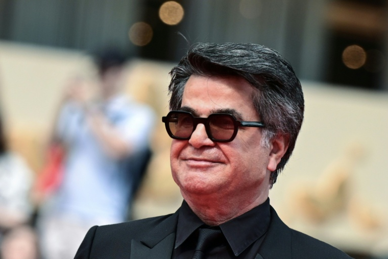 Le réalisateur, scénariste et producteur iranien Jafar Panahi arrive pour la projection du film « Un simple accident » lors de la 78e édition du Festival de Cannes, le 20 mai 2025 ( AFP / Miguel MEDINA )