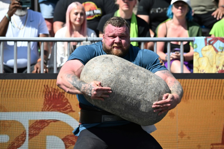 Tom Stoltman de Grande-Bretagne participe au tour de qualification du concours de "L'homme le plus fort du monde", le 16 mai 2025 à Sacramento, en Californie ( AFP / Robyn Beck )