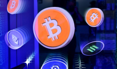 Logos du bitcoin et d'autres crypto-monnaies ( AFP / Giuseppe CACACE )