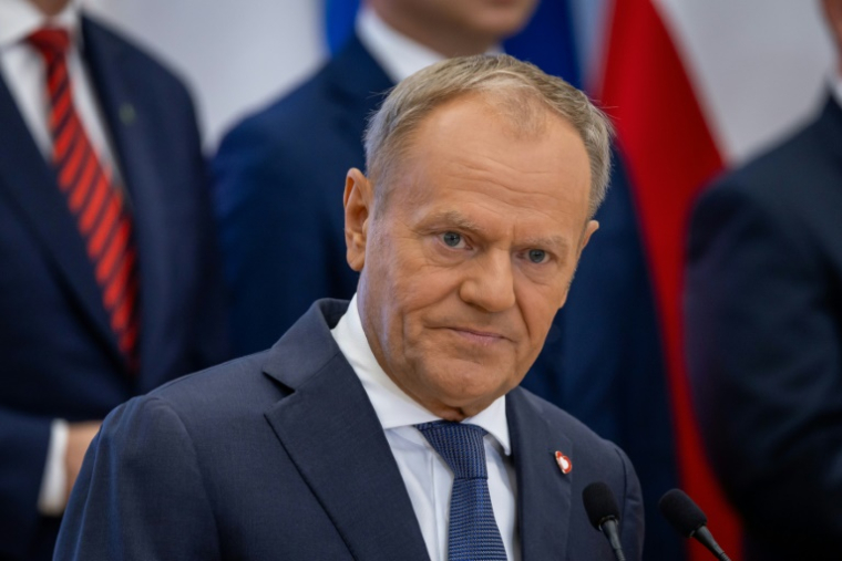 Le Premier ministre polonais Donald Tusk lors d'une conférence de presse à Varsovie, le 23 juillet 2025 ( AFP / Wojtek RADWANSKI )