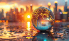 Globe terrestre devant des immeubles (Crédits: Adobe Stock)