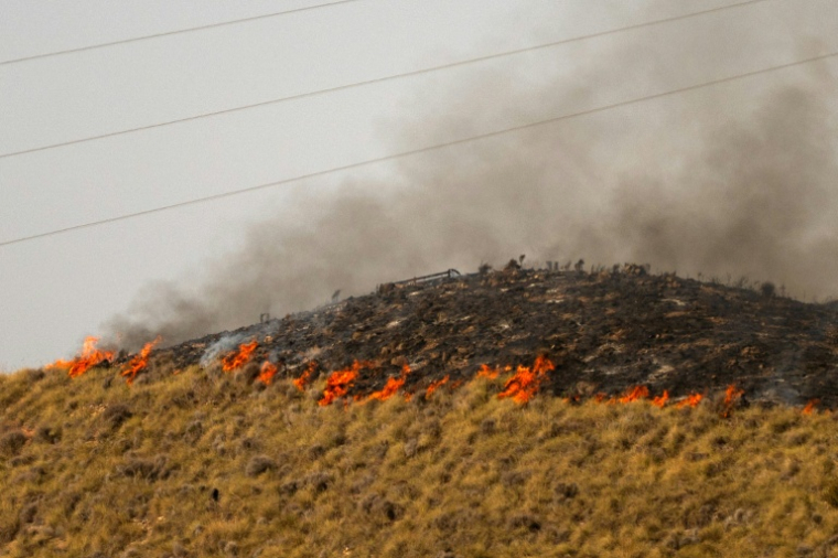 Des flammes s'étendent sur un colline près de Bedar, dans le district de Los Gallardos, dans la province espagnole d'Almería, le 11 juillet 2026 en Espagne ( AFP / JORGE GUERRERO )