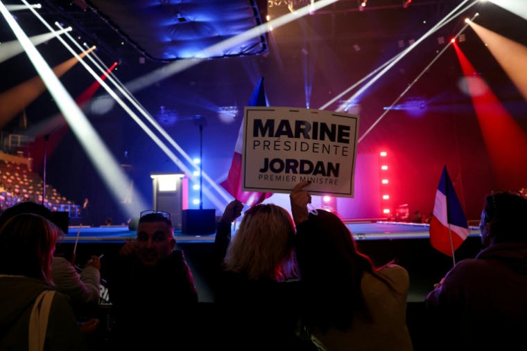Des participants au congrès du Rassemblement national (RN) à Orléans, le 25 octobre 2026  ( AFP / Alain JOCARD )