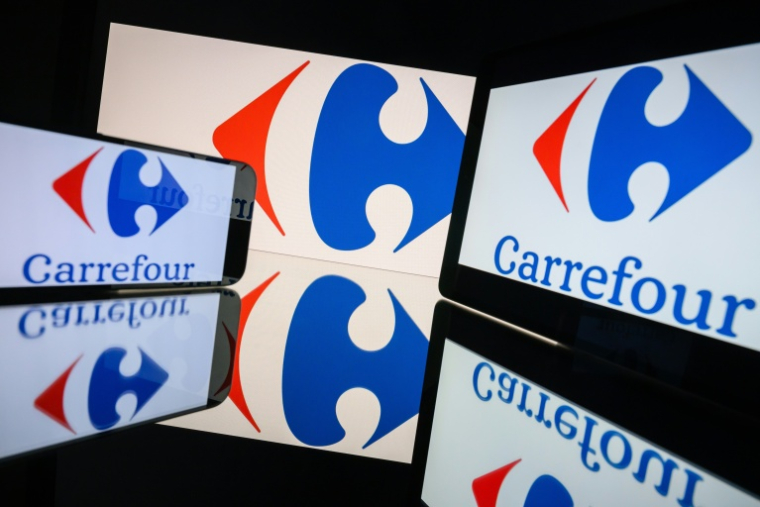 Logo de Carrefour, Toulouse, le 31 mars 2026 ( AFP / Lionel BONAVENTURE )
