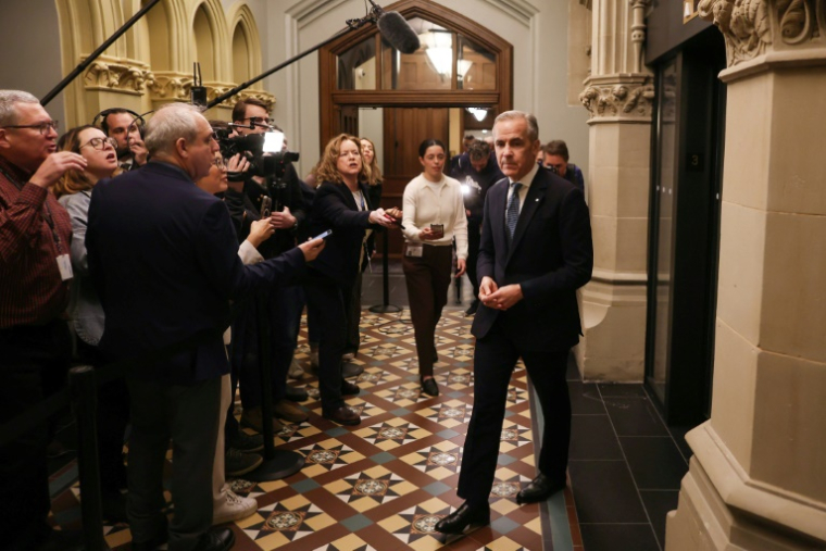 Le Premier ministre canadien et candidat libéral, Mark Carney, au Parlement à Ottawa, le 11 avril 2025 ( AFP / Dave Chan )