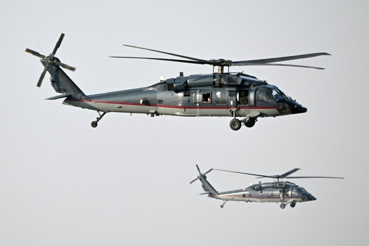 Des hélicoptères Sikorsky, dans le ciel d'Irak (illustration) ( POOL / ANDREW CABALLERO-REYNOLDS )