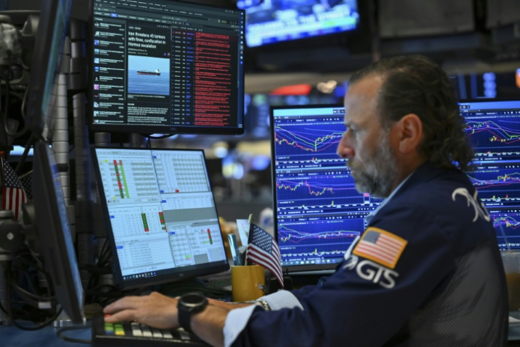 Un opérateur à la Bourse de New York, le 24 août 2026 ( AFP / ANGELA WEISS )