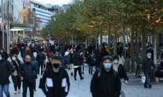 People walk along the Zeil shopping promenade, in Frankfurt